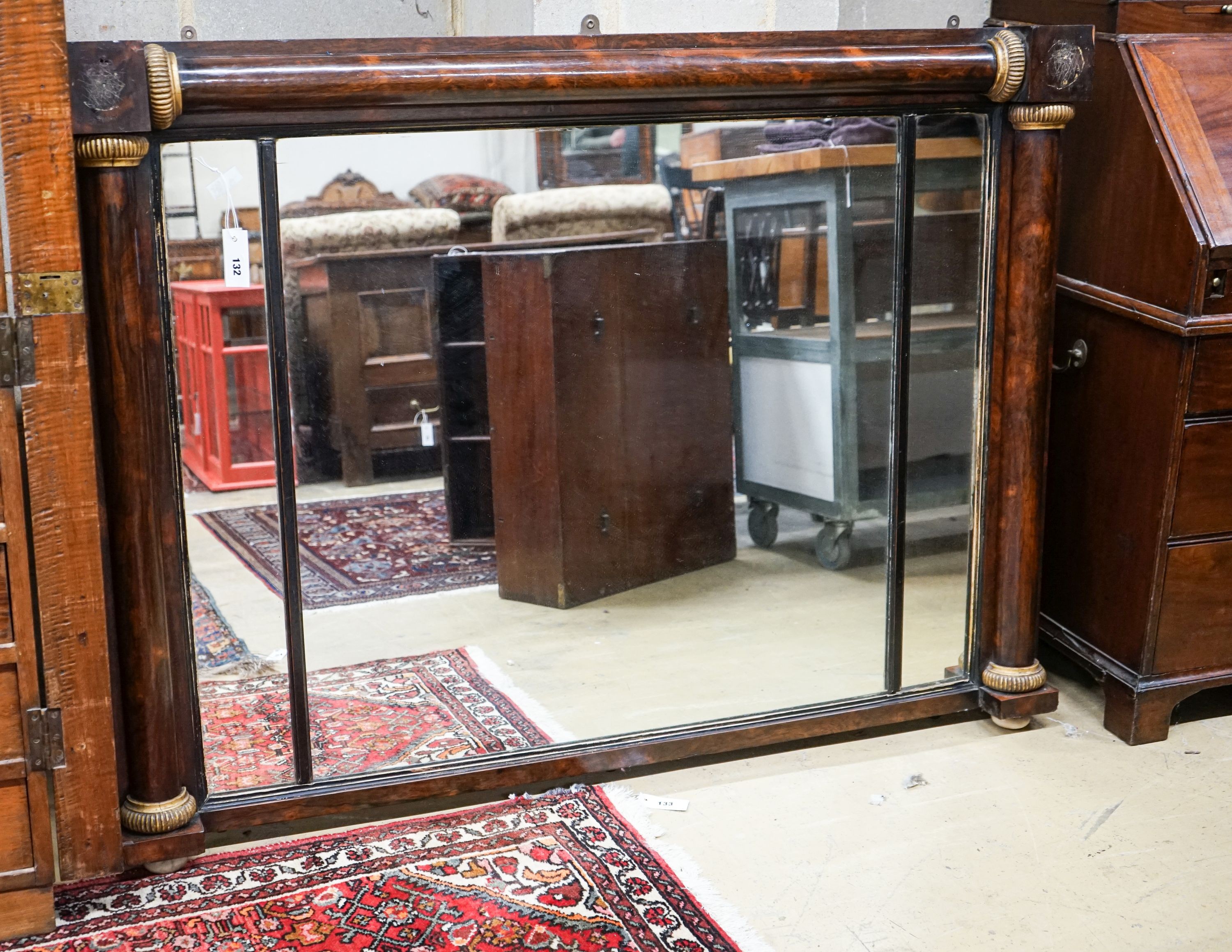 A Victorian parcel gilt rosewood overmantel mirror, width 139cm, height 102cm